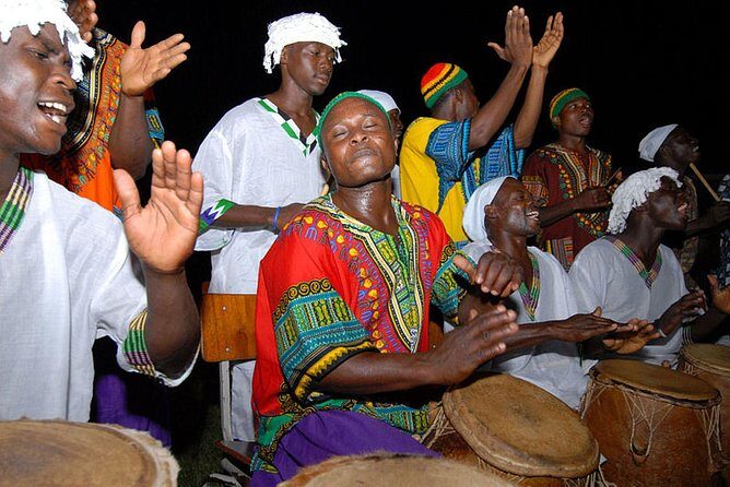 10 Days Trip to Cape Coast and Elmina Castles from Accra - Day 5: Cape Coast Direction, Kejetia Market, and Elmina by Night
