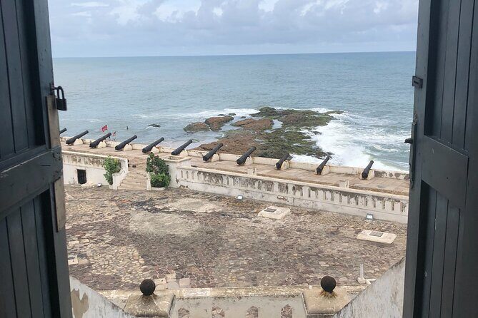 One Day Tour To Cape Coast, Elmina Castle, Kakum National Park - Elmina Castle: When the Guide Turns the Walls Into Meaning